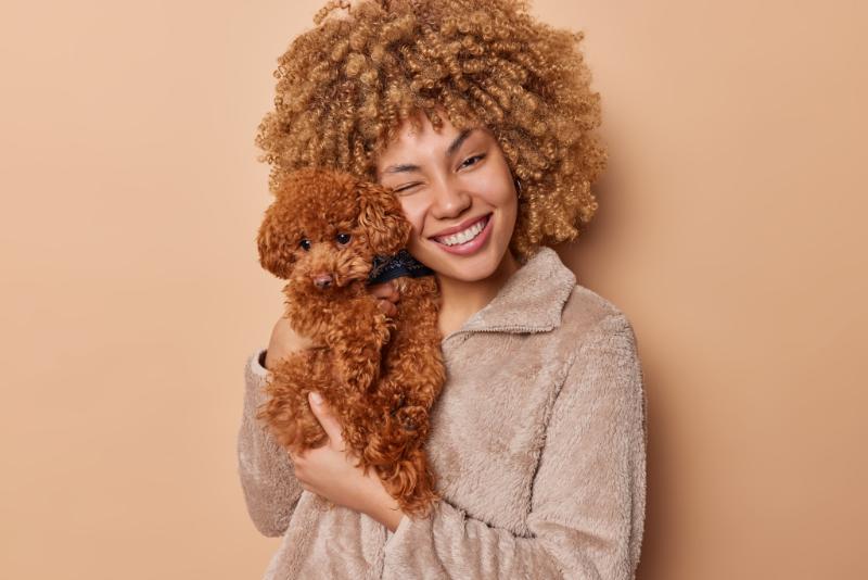Furmom and toy poodle pet