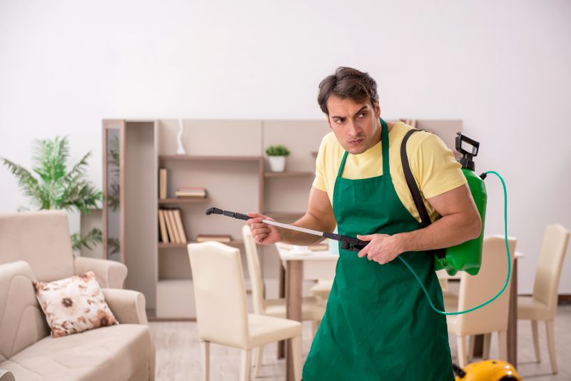Young man doing housework indoors